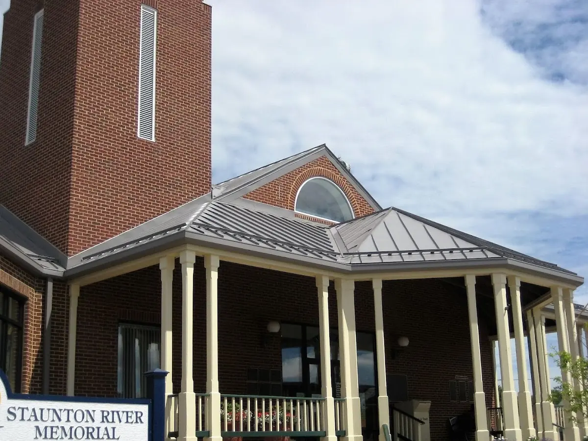 Skilled roofing craftsmen working on a residential roof in Severn Landing